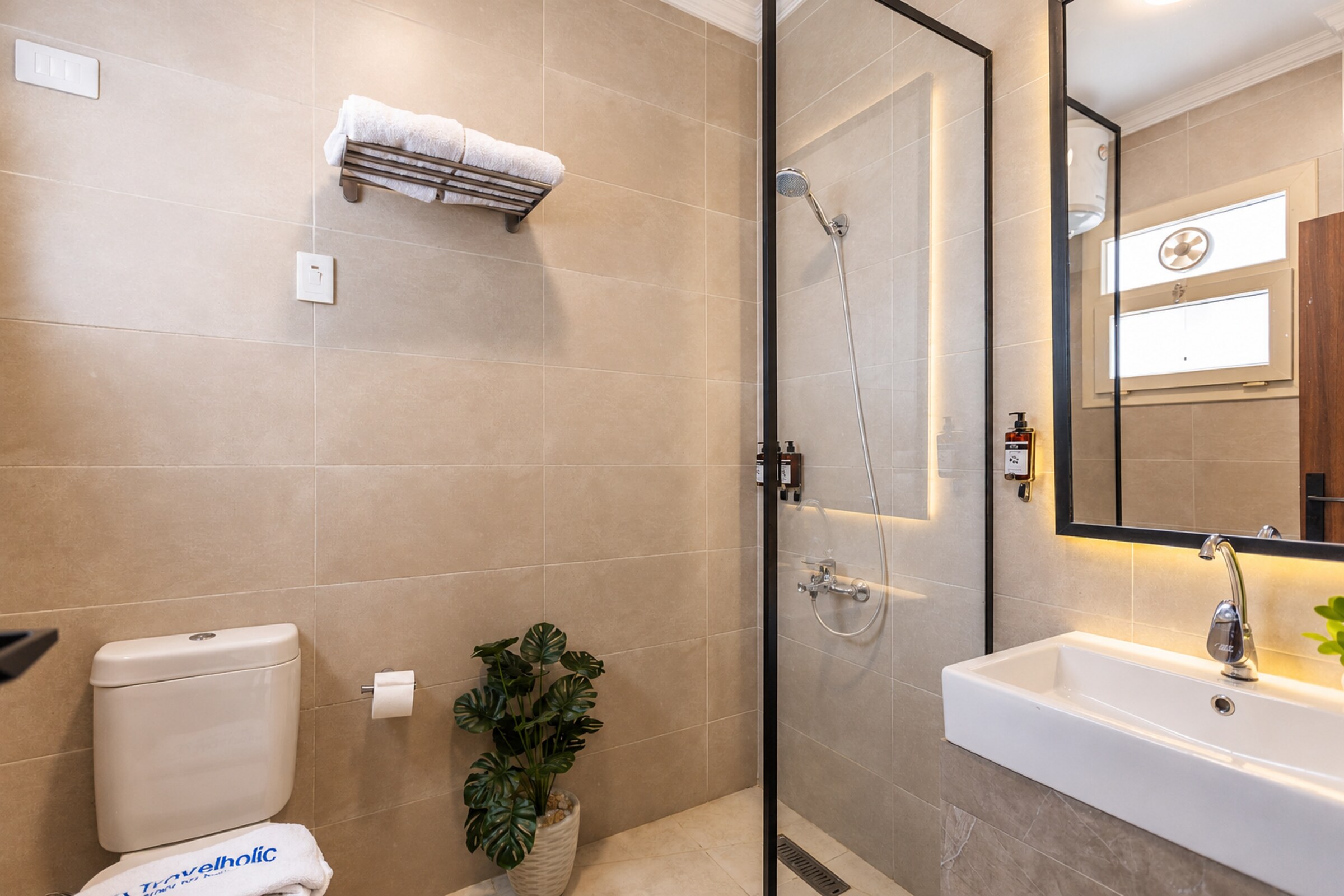 Travelholic Arabian Nights 1BR with Balcony | Lotus 102 — Full bathroom 1 in Travelholic Residence near Mivida. Unit 102., Egypt