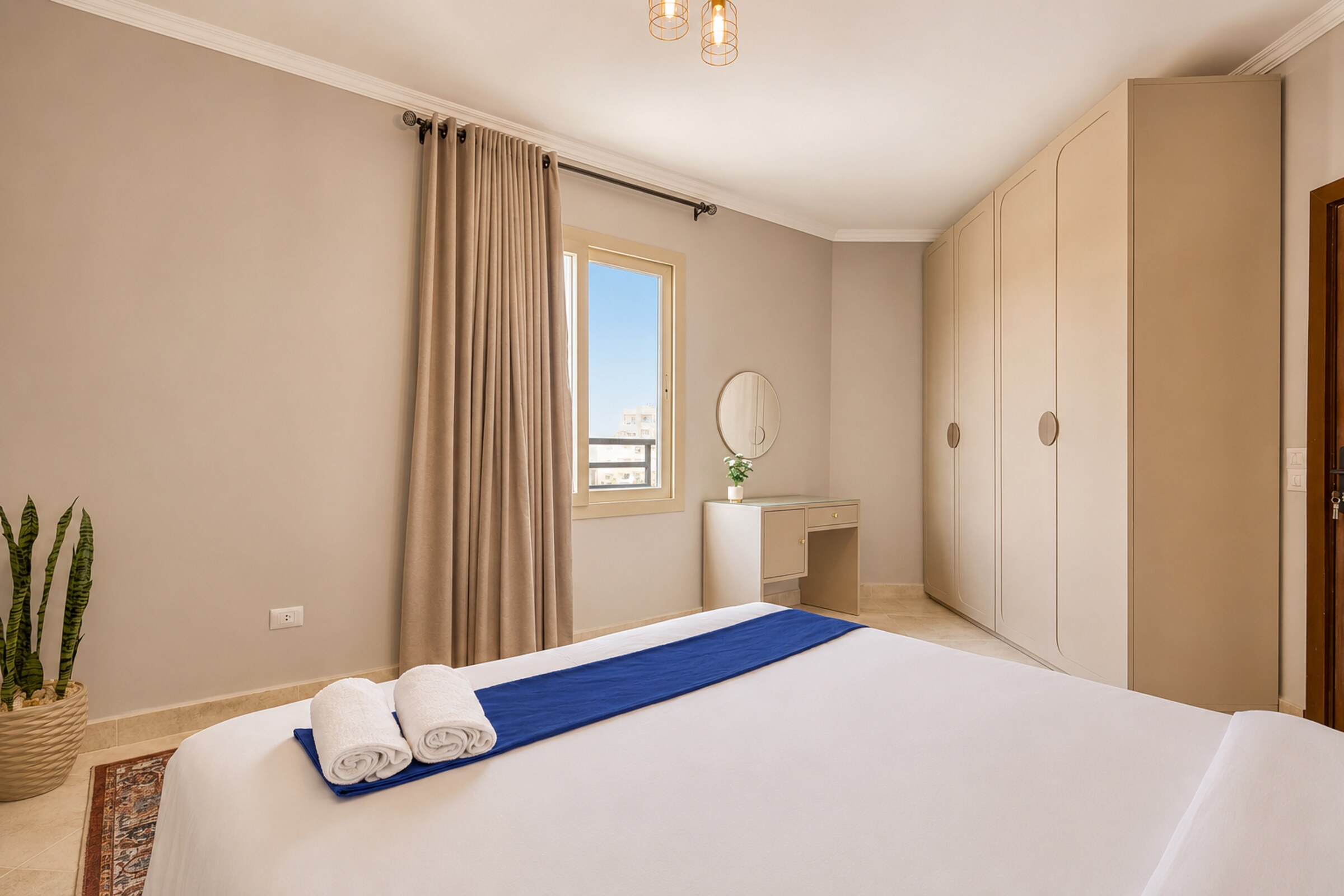 Travelholic Arabian Nights 1BR with Balcony | Lotus 302 — Bedroom 1 in Travelholic Residence near Mivida. Unit 302., Egypt