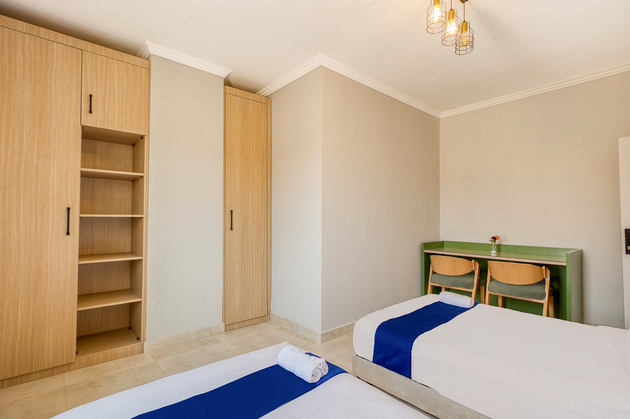 Travelholic Green Light 2BR with Balcony | Lotus 103 — Bedroom 2 in Travelholic Residence near Mivida. Unit 103., Egypt — photo 2