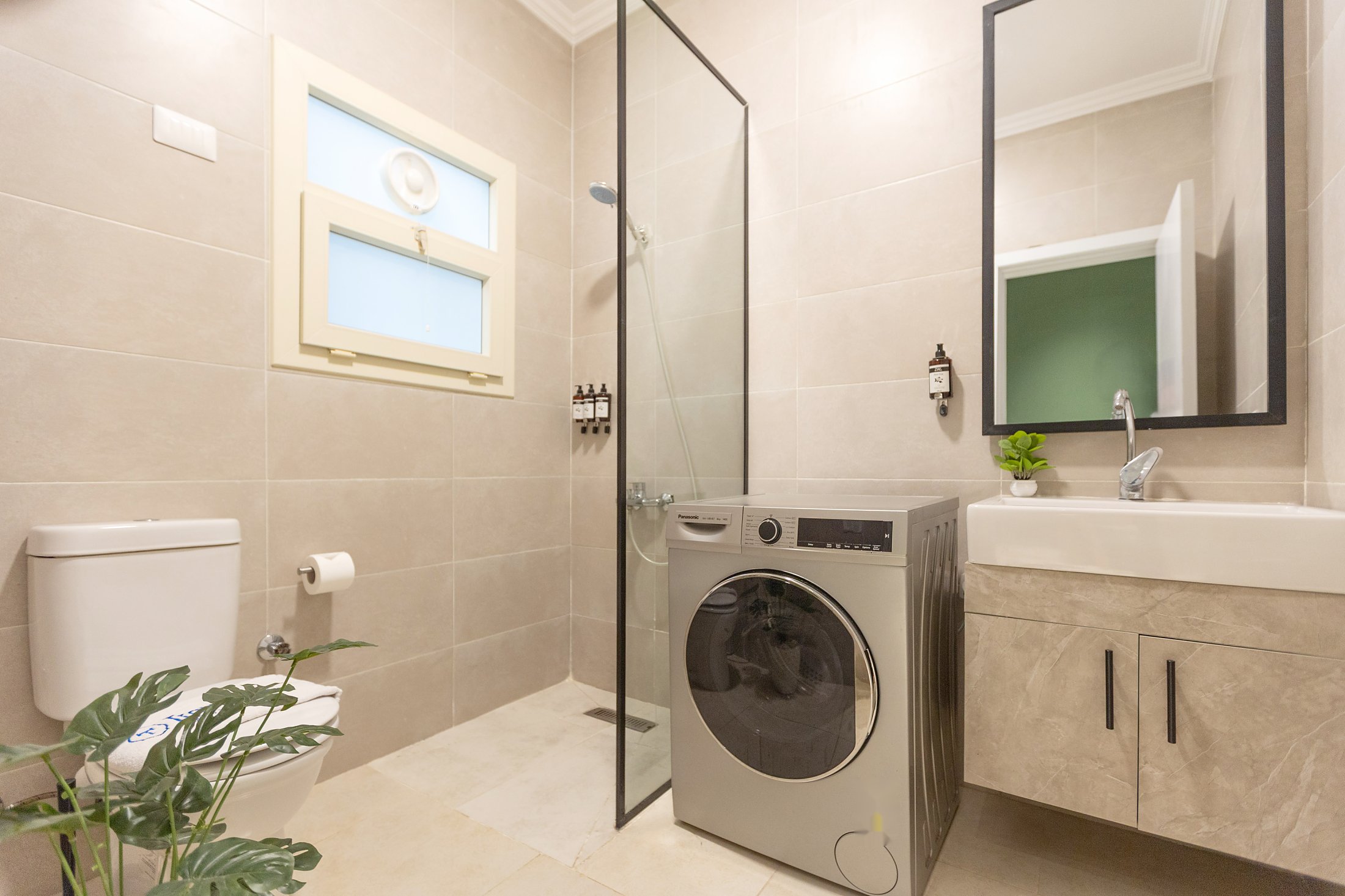 Travelholic Green Light 2BR with Balcony | Lotus 103 — Full bathroom 1 in Travelholic Residence near Mivida. Unit 103., Egypt — photo 2