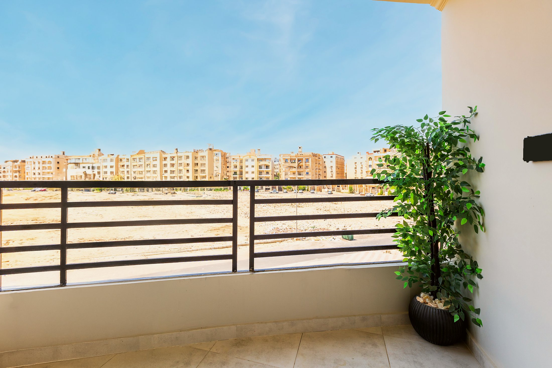 Travelholic Green Light 2BR with Balcony | Lotus 203 — Balcony in Travelholic Residence near Mivida. Unit 203., Egypt