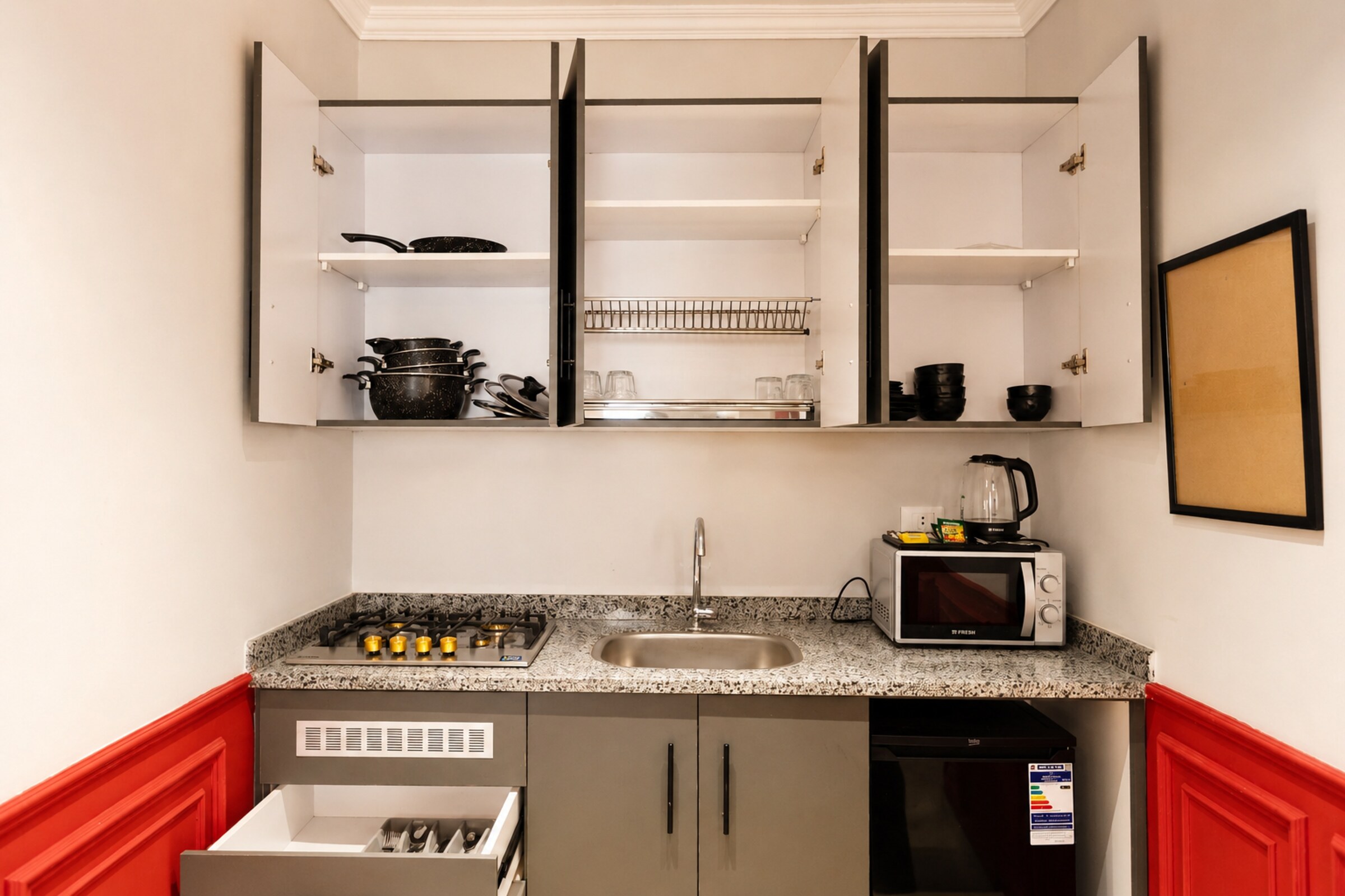 Travelholic Ruby 1BR with Balcony | Lotus 305 — Full Kitchen in Travelholic Residence near Mivida. Unit 305., Egypt
