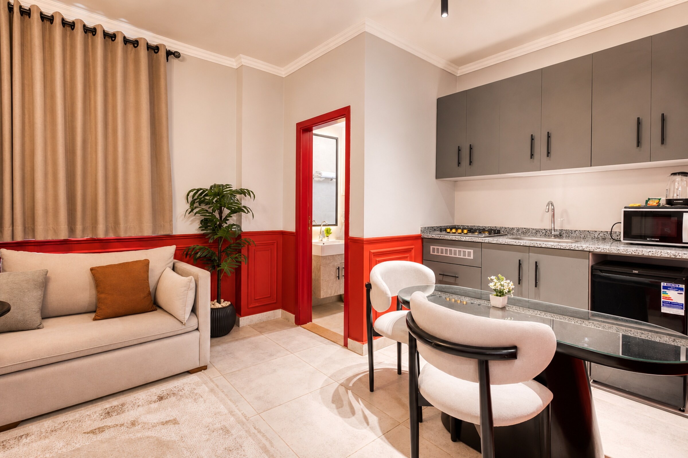 Travelholic Ruby 1BR with Balcony | Lotus 305 — Full Kitchen in Travelholic Residence near Mivida. Unit 305., Egypt — photo 3