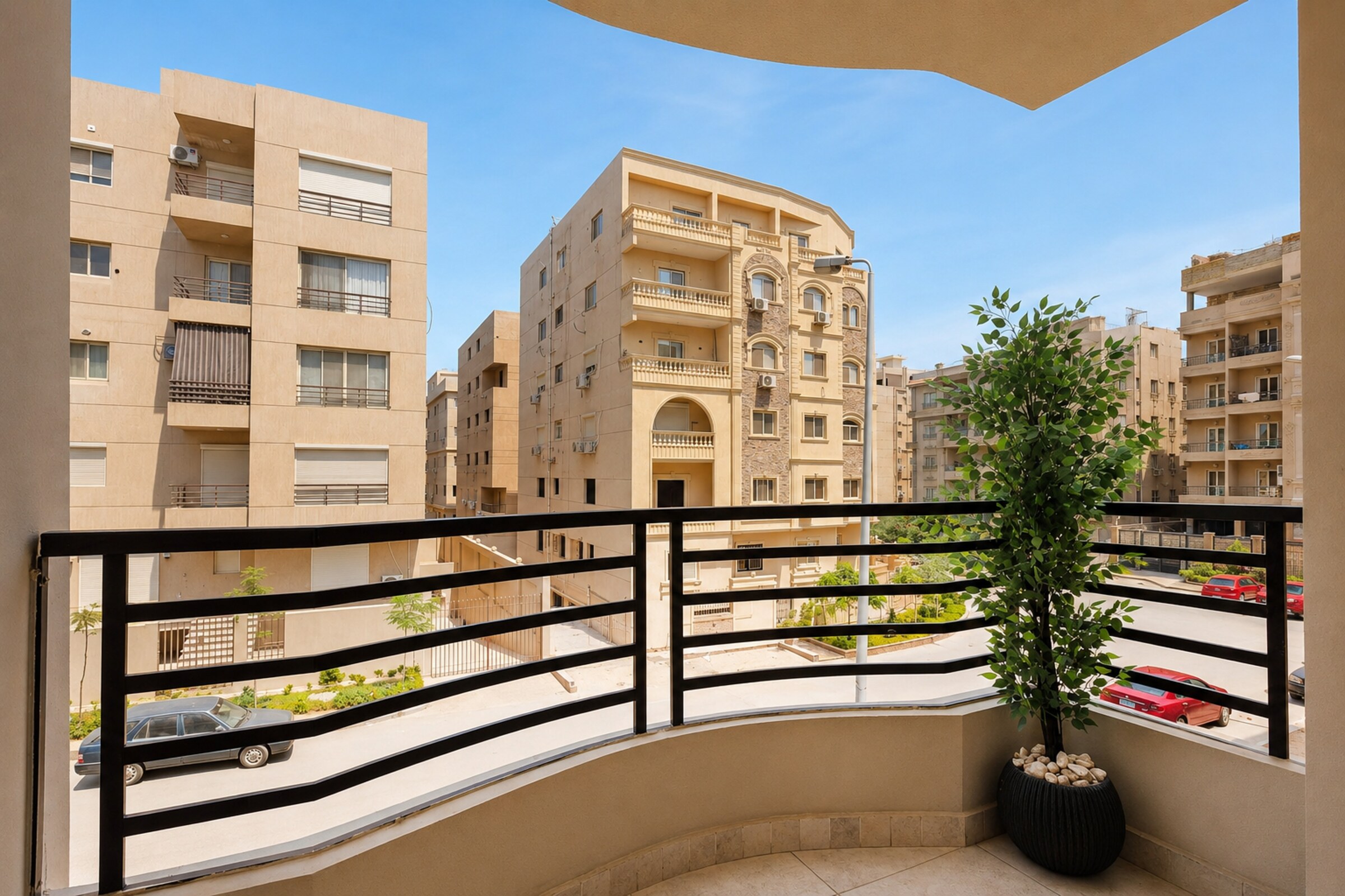 Travelholic Ruby 1BR with Balcony | Lotus 305 — Balcony in Travelholic Residence near Mivida. Unit 305., Egypt