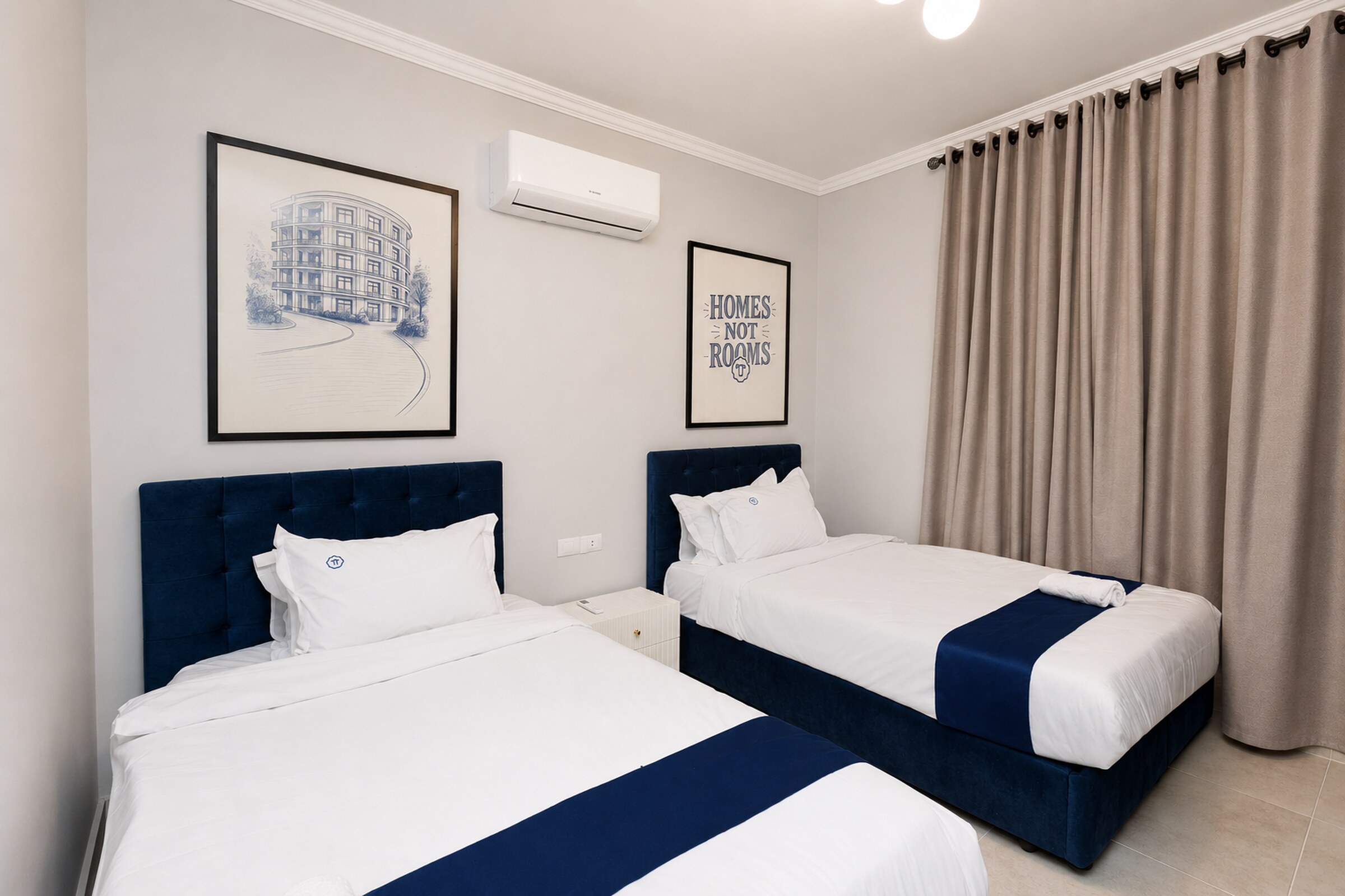 Travelholic Navy Nest 2BR Apartment | Lotus 106 — Bedroom 2 in Travelholic Residence near Mivida. Unit 106., Egypt — photo 2