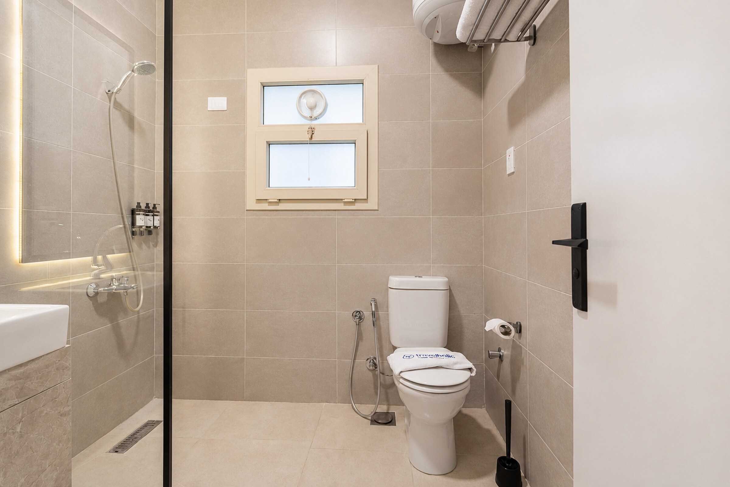Travelholic Navy Nest 2BR Apartment | Lotus 106 — Full bathroom 1 in Travelholic Residence near Mivida. Unit 106., Egypt