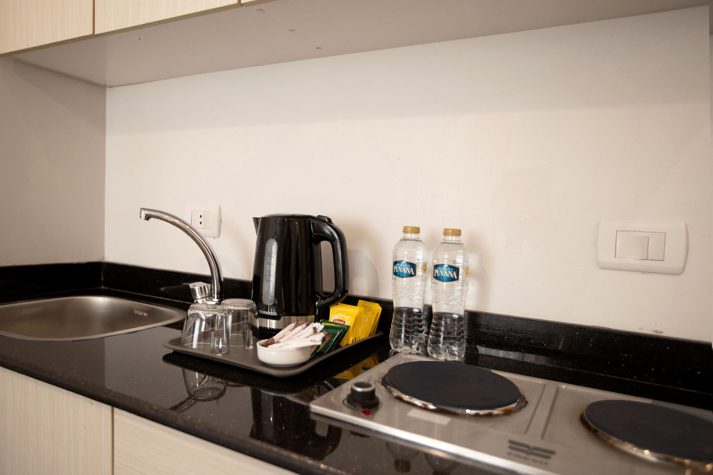 Travelholic Compact Twin Studio near AUC | AUC 301 — Full Kitchen in Travelholic AUC Residence. Unit 301., Egypt — photo 2