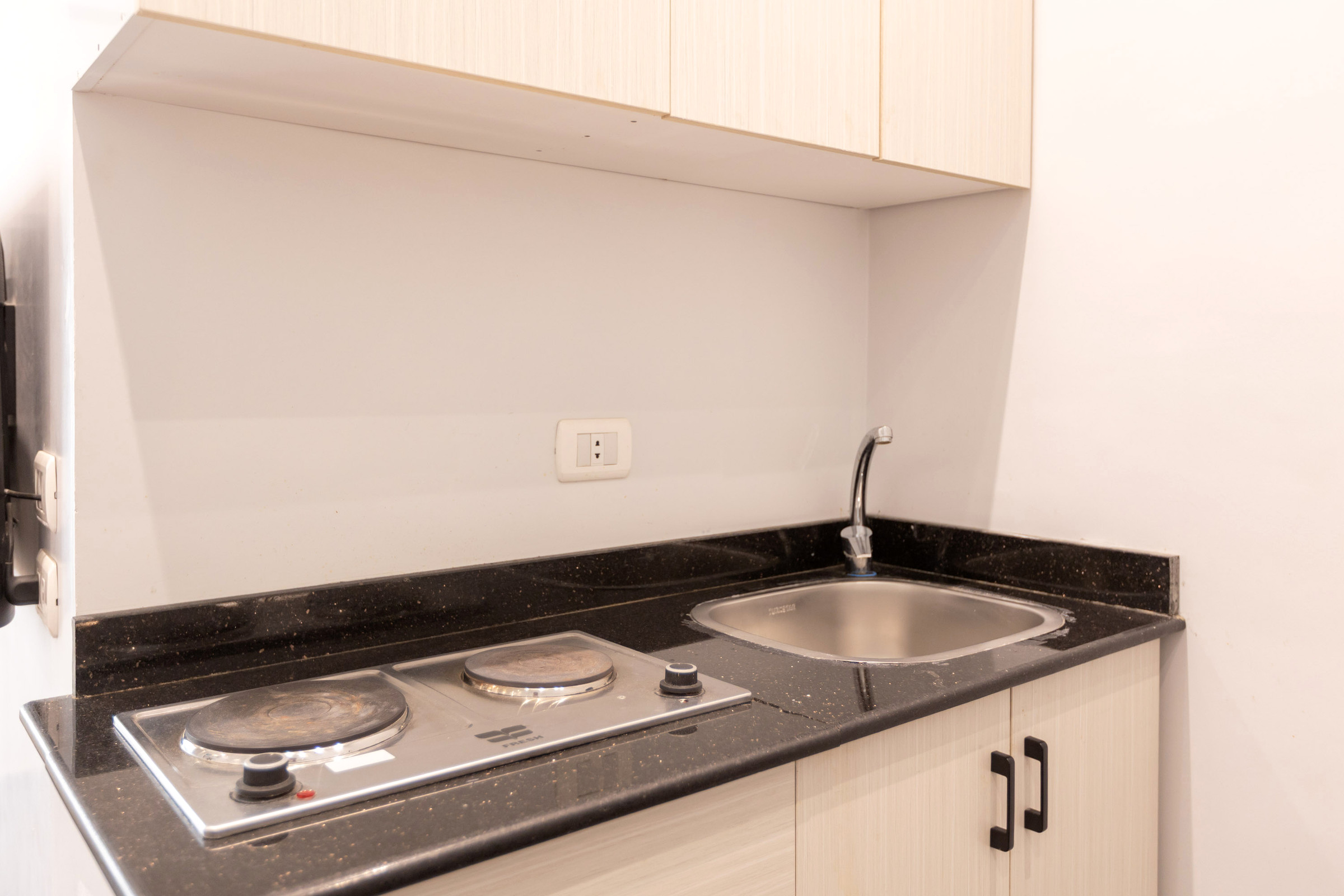 Travelholic Compact Queen Studio near AUC | AUC 402 — Full Kitchen in Travelholic AUC Residence. Unit 402., Egypt — photo 3