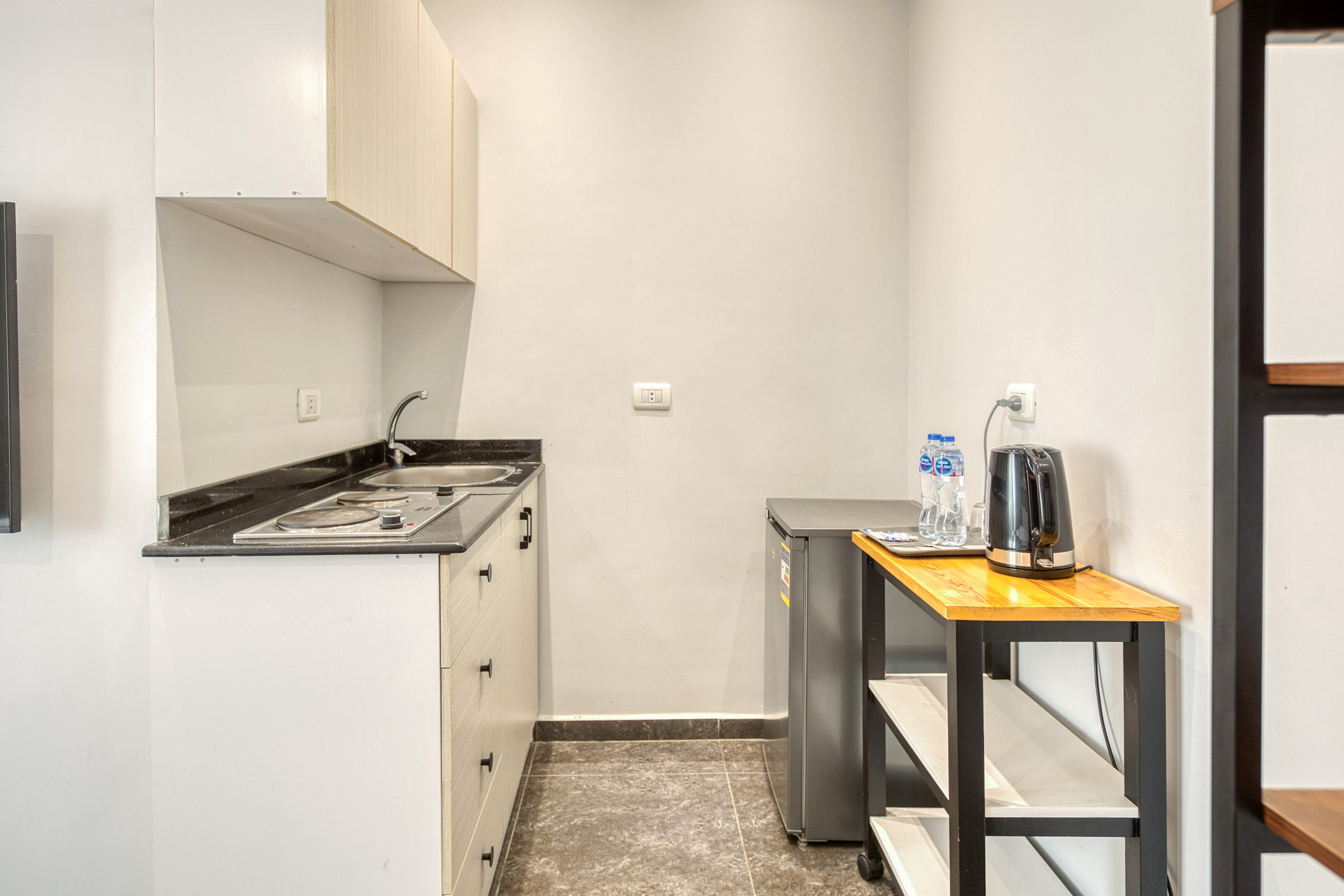 Travelholic Compact Queen Studio near AUC | AUC 302 — Full Kitchen in Travelholic AUC Residence. Unit 302., Egypt
