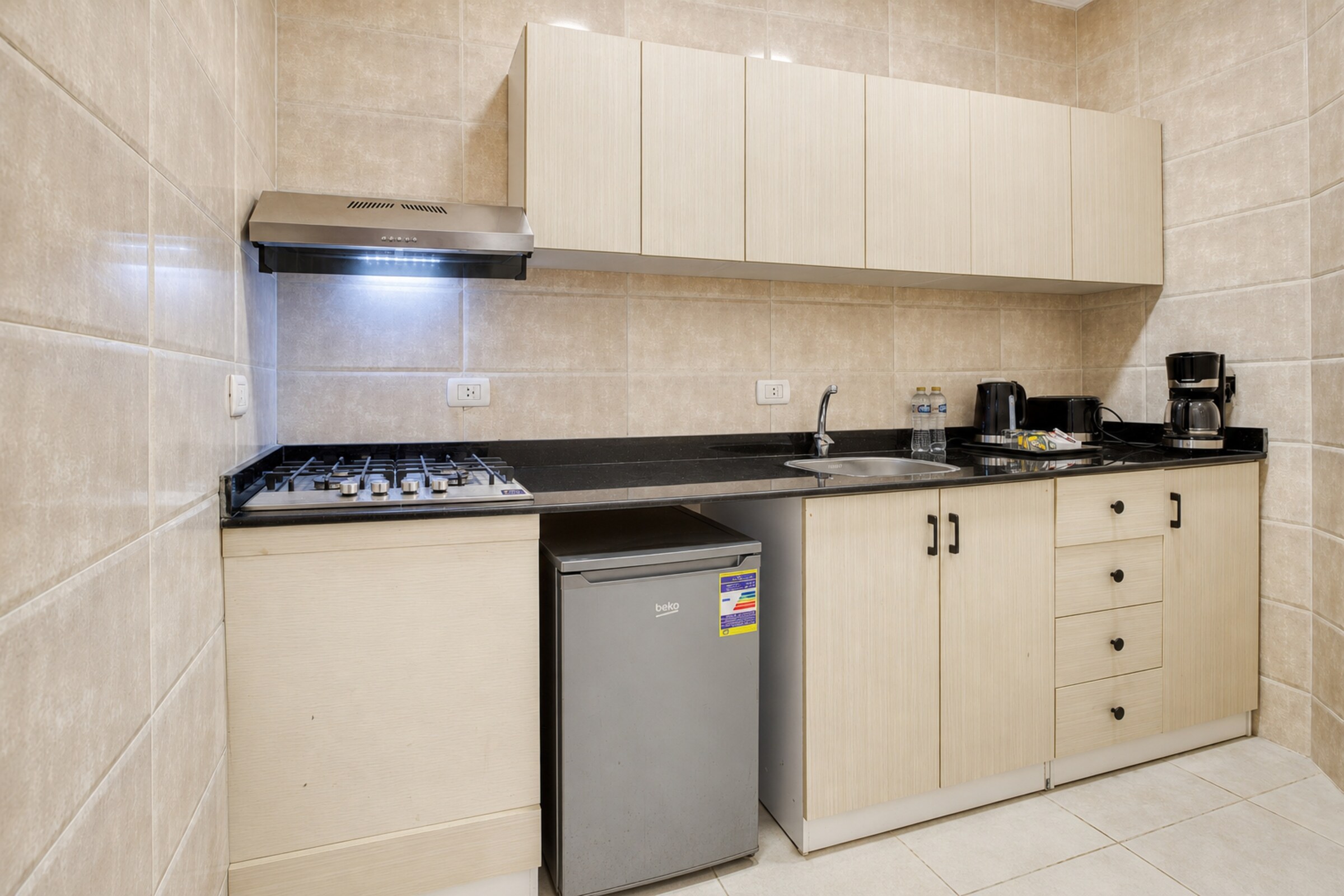 Travelholic Boho Heaven Studio near AUC | AUC 203 — Full Kitchen in Travelholic AUC Residence. Unit 203., Egypt