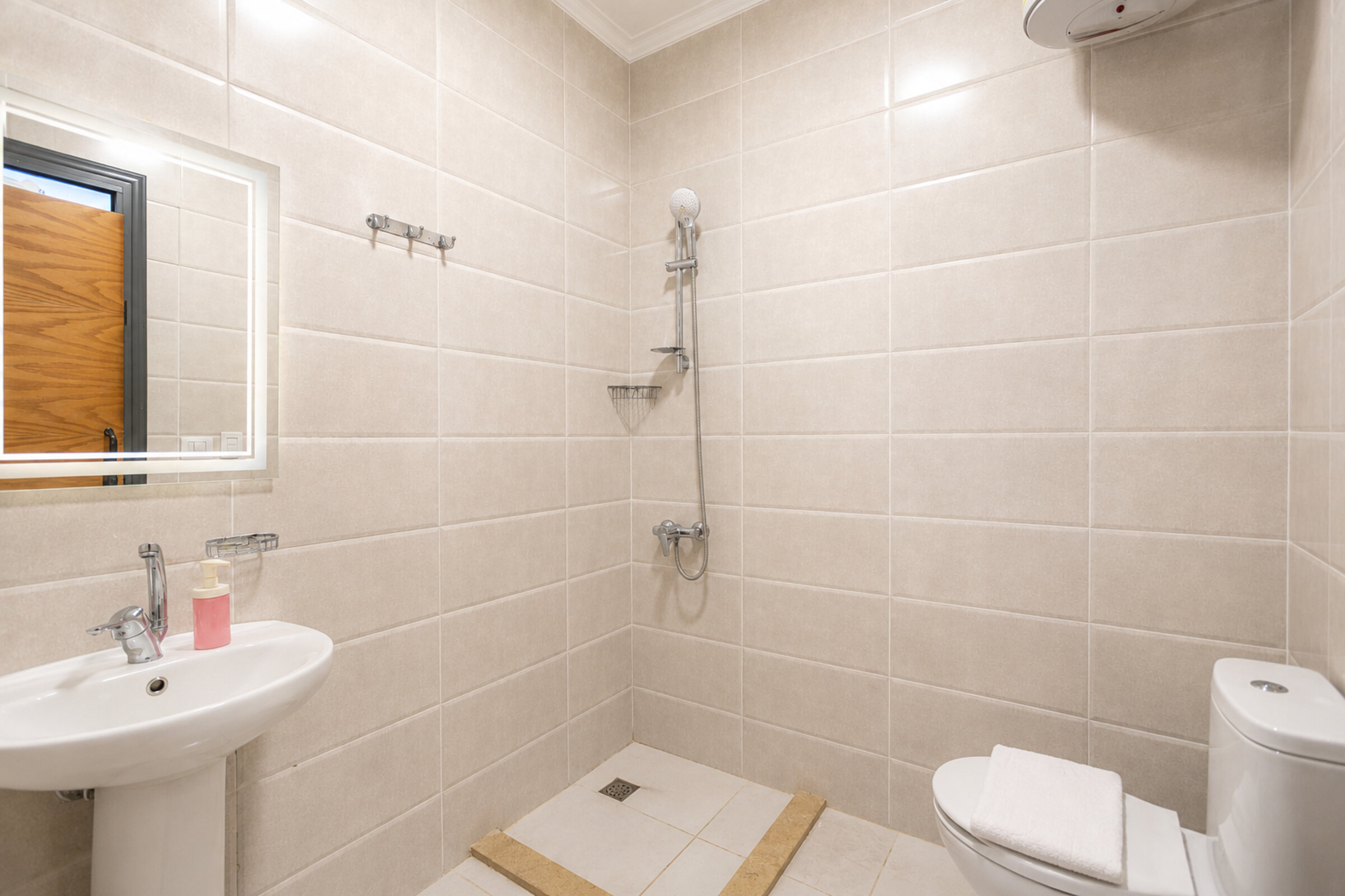 Travelholic Boho Heaven Studio near AUC | AUC 303 — Full bathroom 1 in Travelholic AUC Residence. Unit 303., Egypt