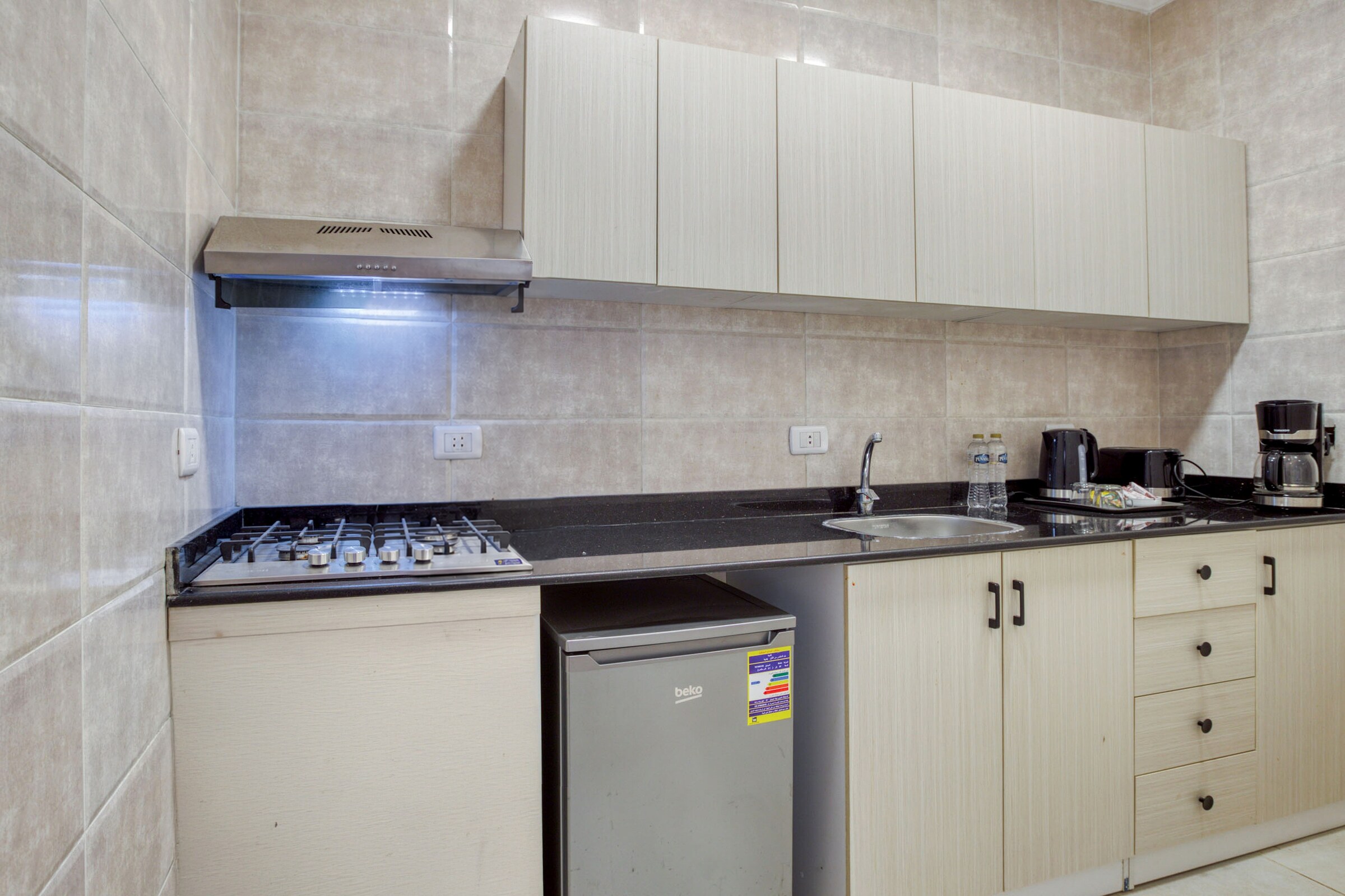 Travelholic Boho Heaven Studio near AUC | AUC 403 — Full Kitchen in Travelholic AUC Residence. Unit 403., Egypt — photo 3