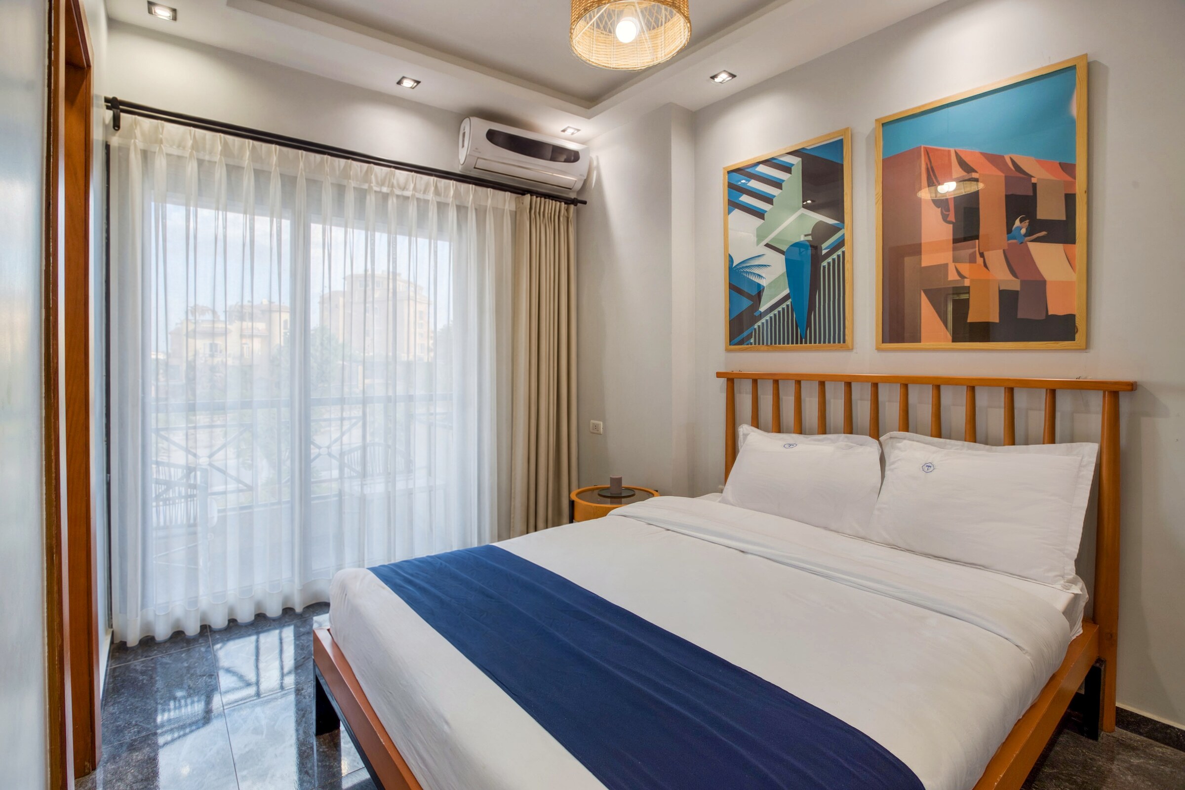 Travelholic Sunlit 2BR Apartment near AUC | AUC 404 — Bedroom 1 in Travelholic AUC Residence. Unit 404., Egypt