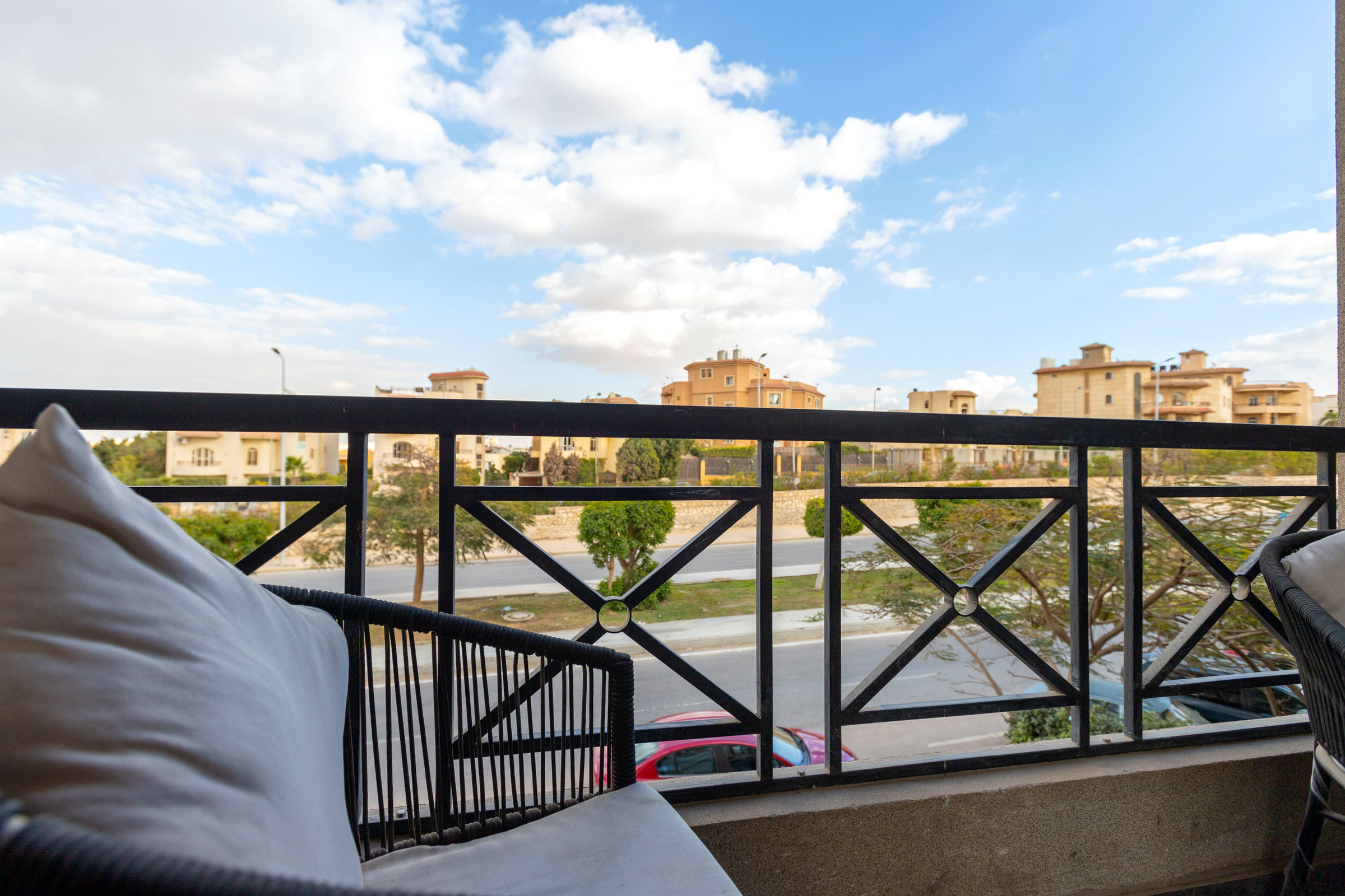 Travelholic Sunlit 2BR Apartment near AUC | AUC 304 — Balcony in Travelholic AUC Residence. Unit 304., Egypt