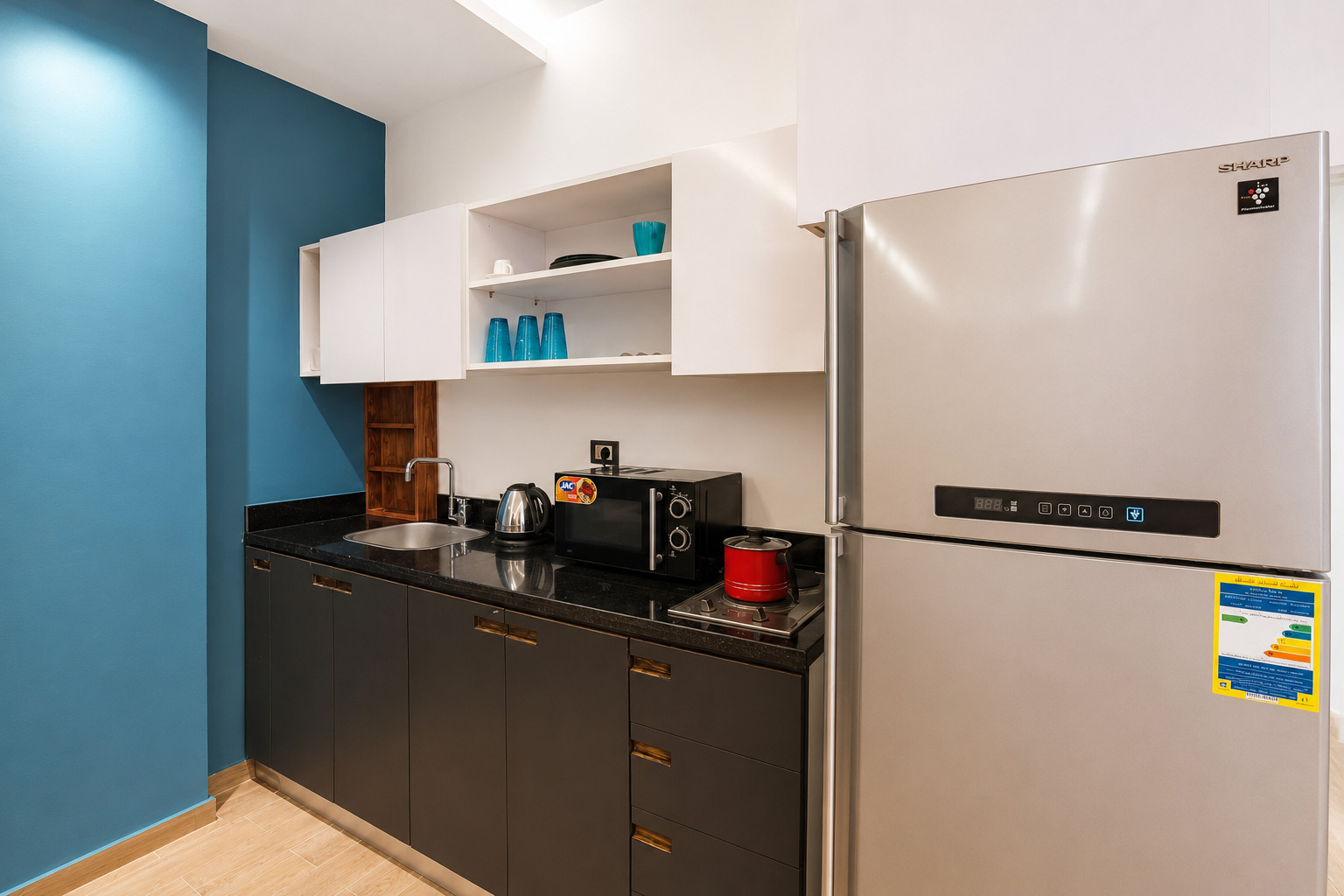 Travelholic Standard 1BR Apartment near CFC | South Academy 303 — Full Kitchen in Travelholic New Cairo Residence. Unit 303., Egypt