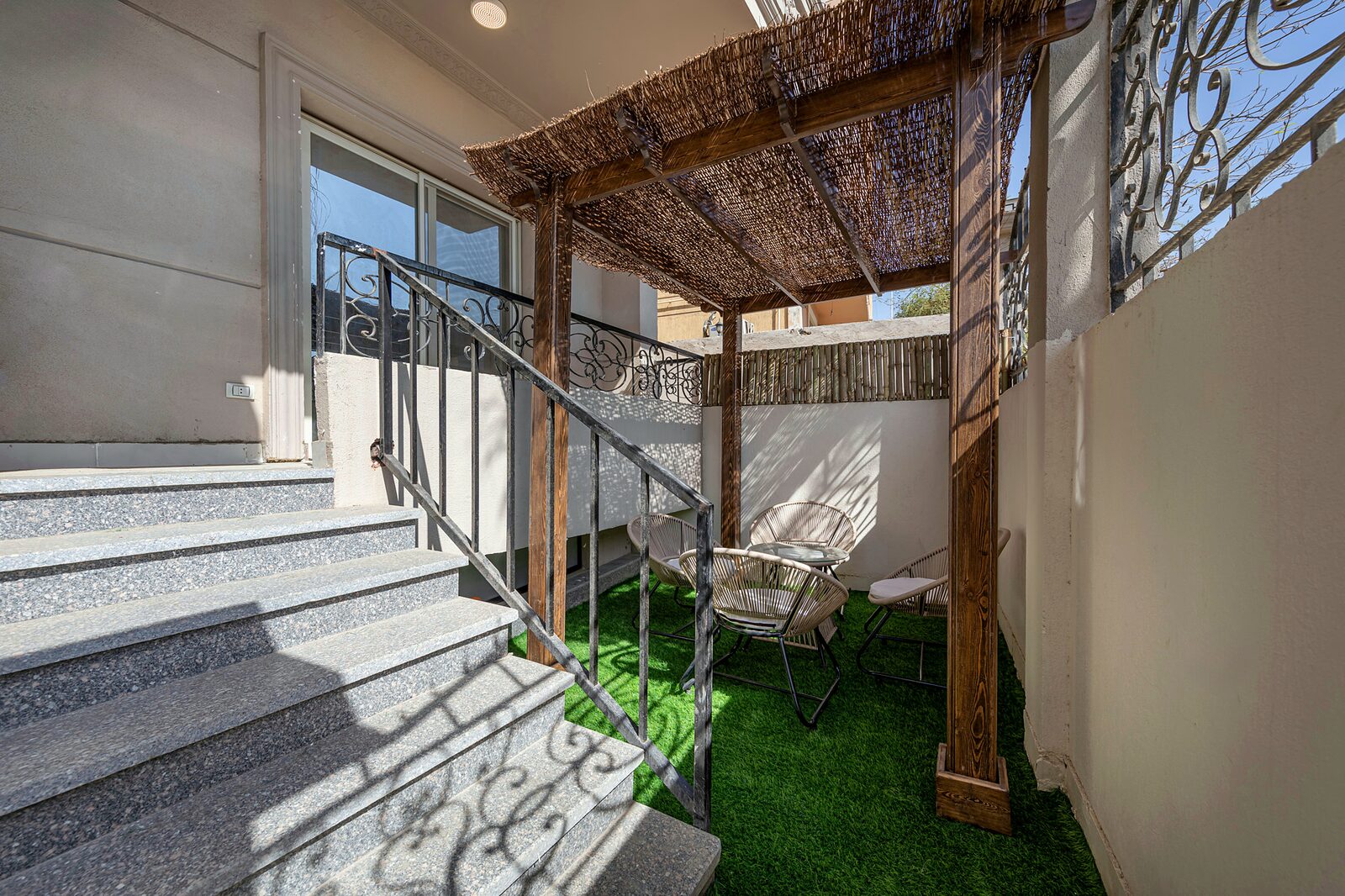 Travelholic Boho Garden 2BR Apartment | 90 Residence 102 — Backyard in Travelholic 90st Residence. Unit 102., Egypt