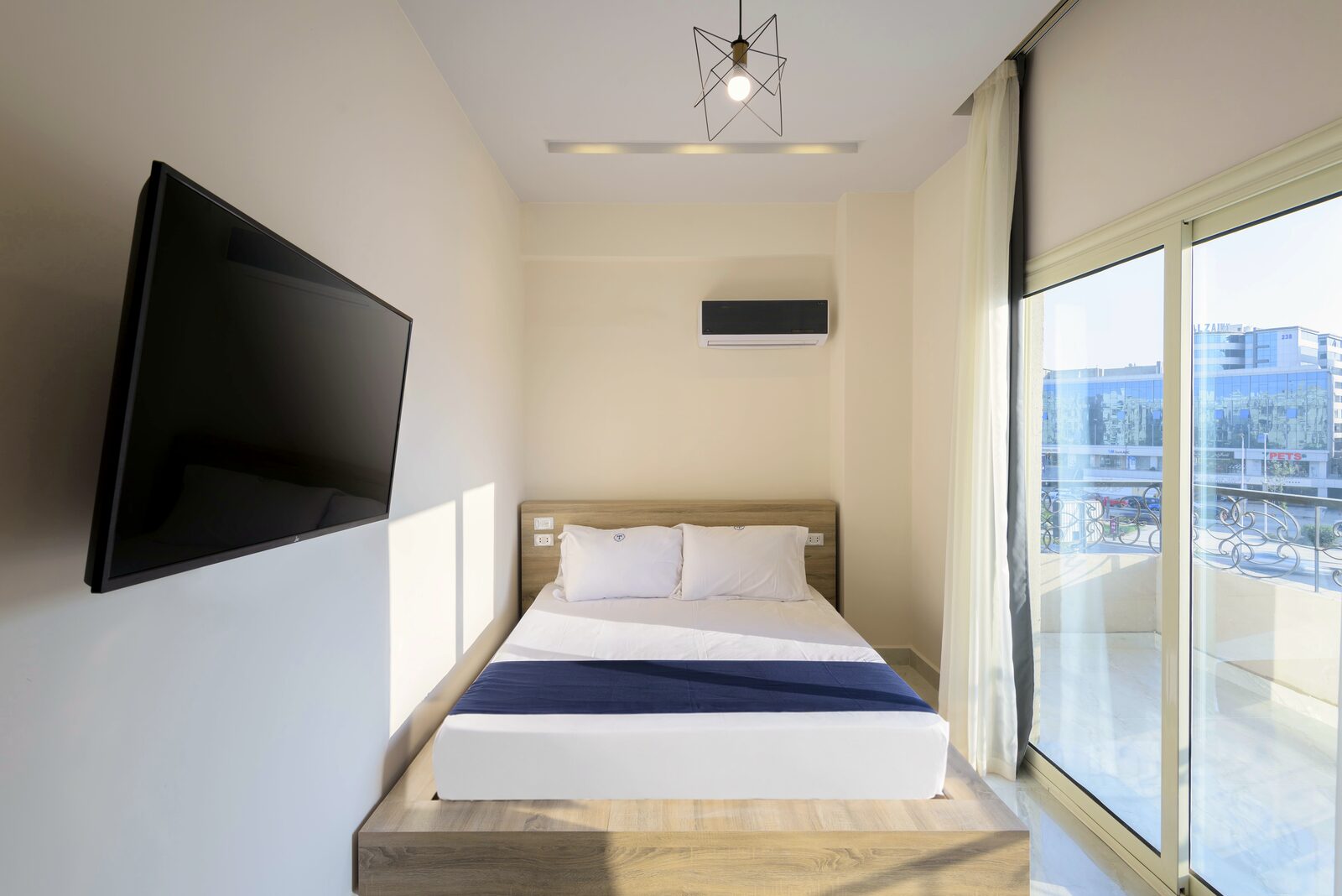 Travelholic Terra Cotta 2BR with Balcony | 90 Residence 403 — Bedroom 1 in Travelholic 90st Residence. Unit 403., Egypt — photo 2