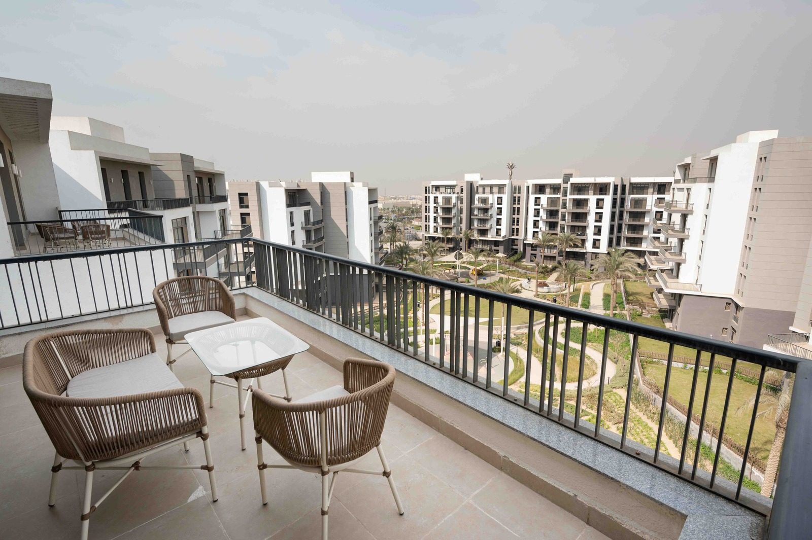 Tranquil 1BR Apartment – City View – CFC — Balcony in Aura, Cairo Festival City, Egypt