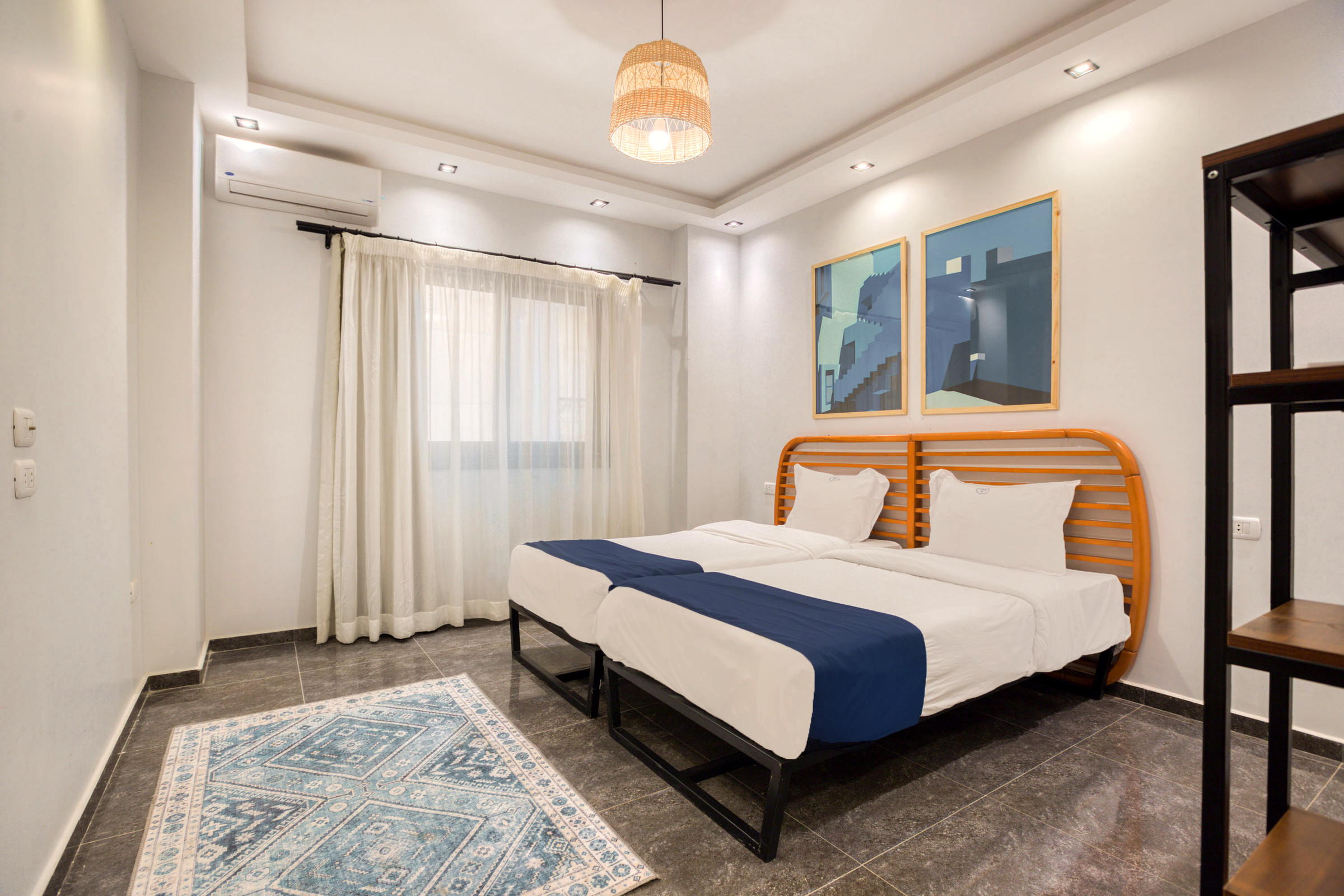 Travelholic Vista 3BR Apartment near AUC | AUC 101 — Bedroom 2 in Travelholic AUC Residence. Unit 101., Egypt — photo 2