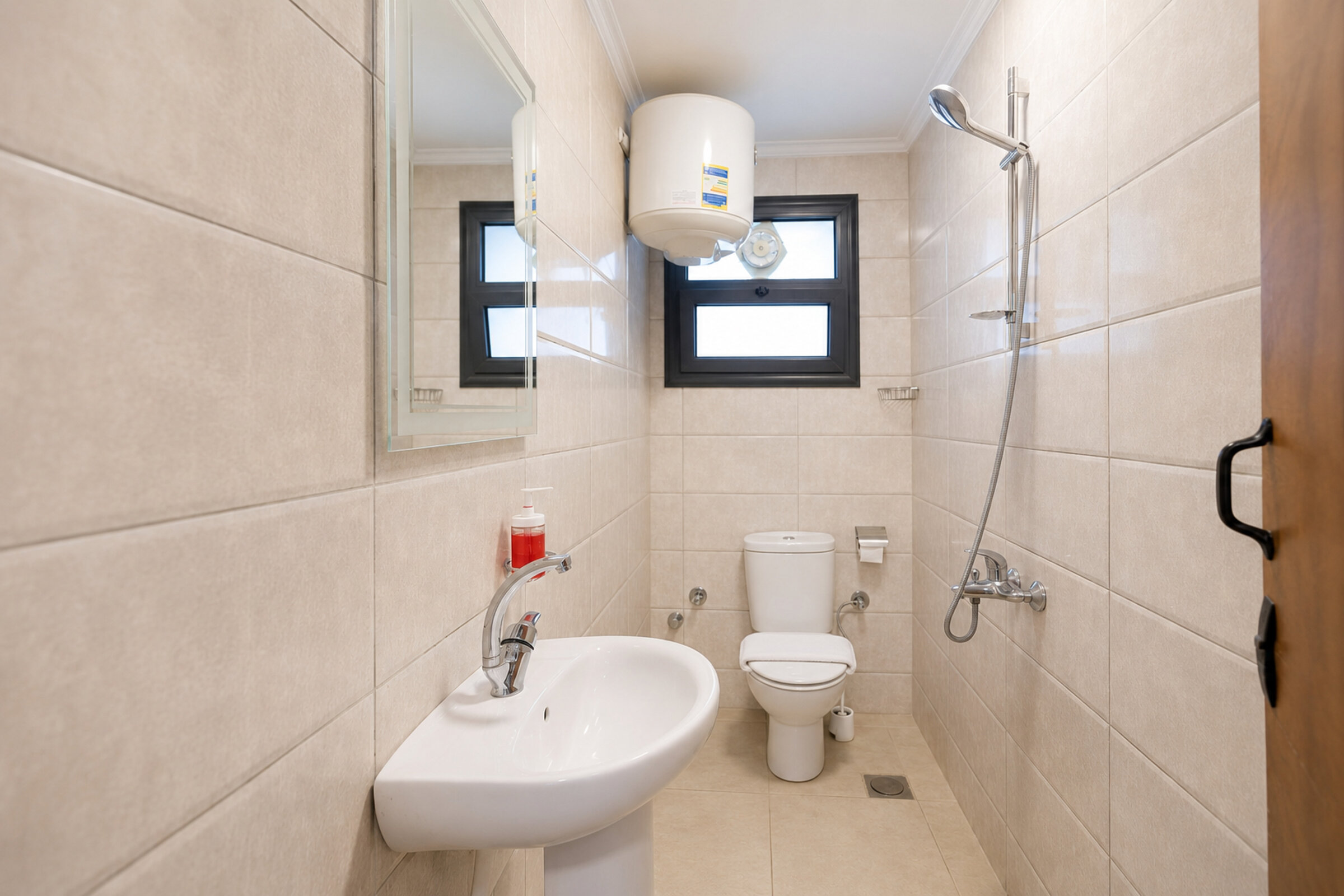 Travelholic Rooftop Studio near AUC | AUC 501 — Full bathroom 1 in Travelholic AUC Residence. Unit 501., Egypt — photo 2