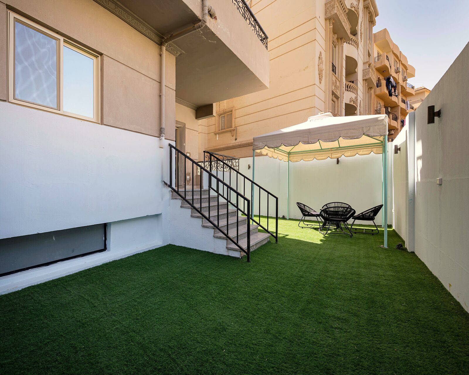 Travelholic Artistic Garden Studio | 90 Residence 105 — Backyard in Travelholic 90st Residence. Unit 105., Egypt