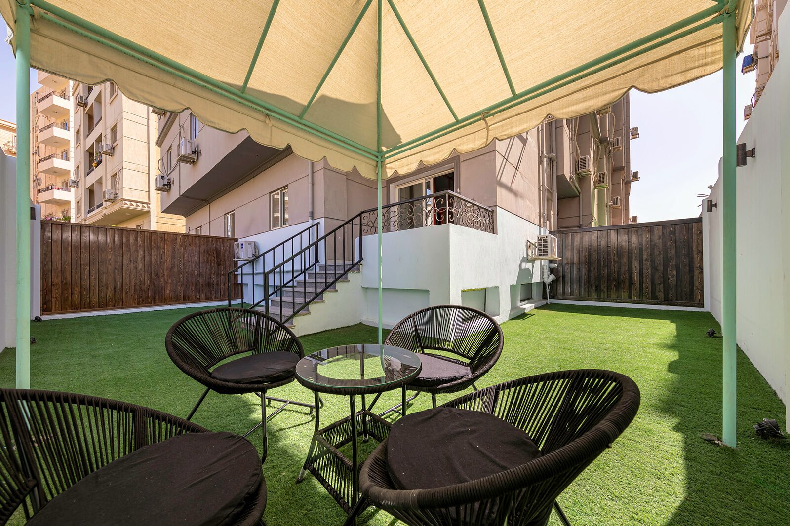 Travelholic Artistic Garden Studio | 90 Residence 105 — Backyard in Travelholic 90st Residence. Unit 105., Egypt — photo 2