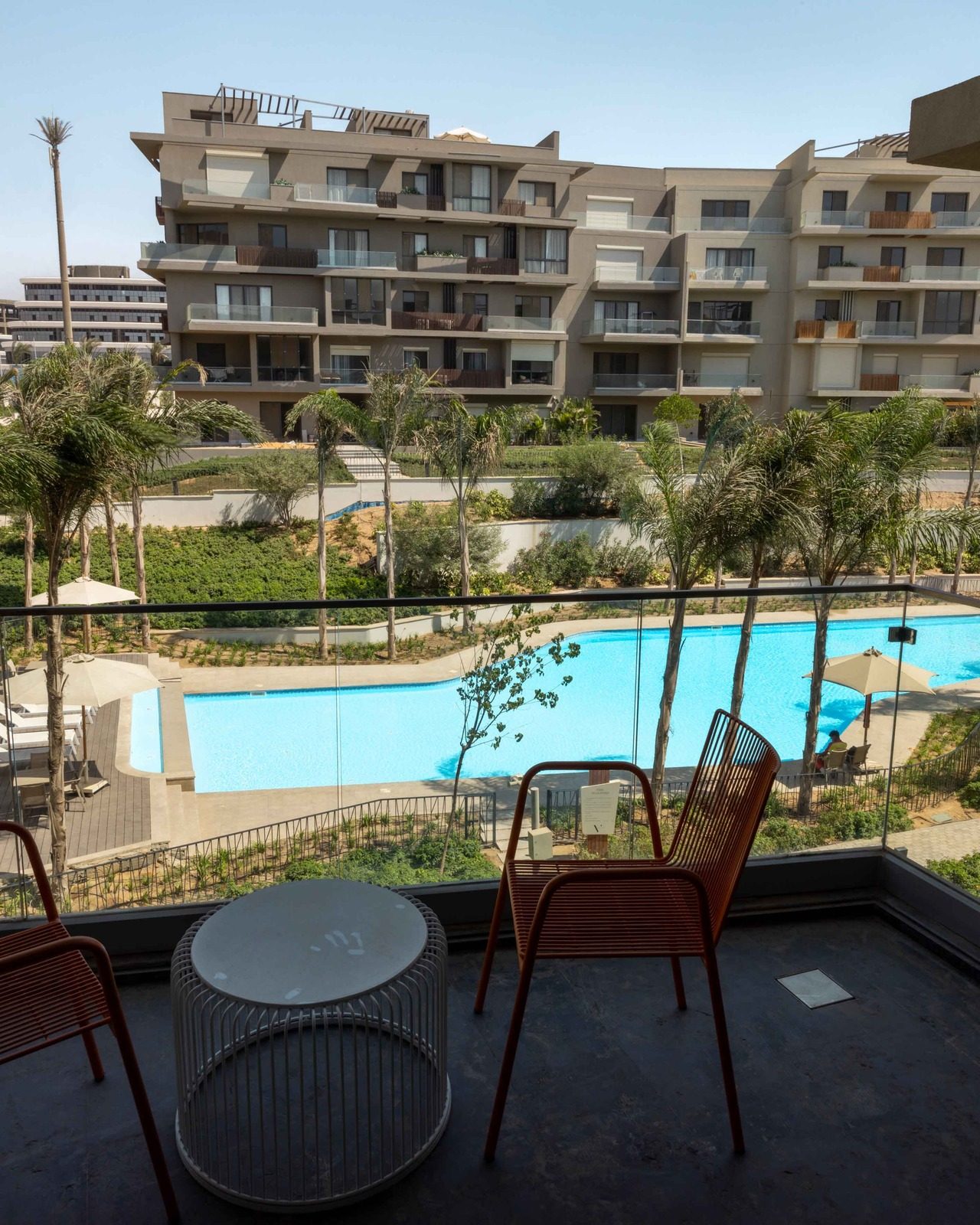 Graceful 3BR Apartment – Pool View – SODIC — Balcony in SODIC Villette, Egypt