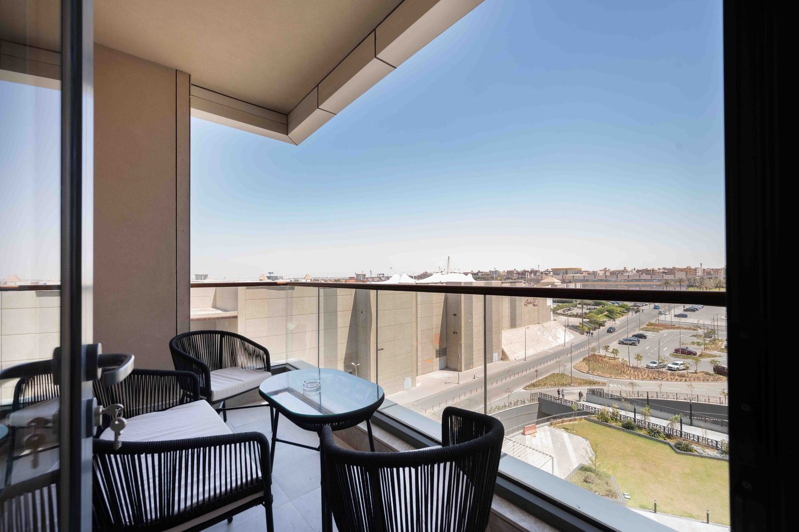 Charming 4BR Apartment – City View – Aeon Towers — Balcony in Aeon Towers, Sheikh Zayed, Egypt