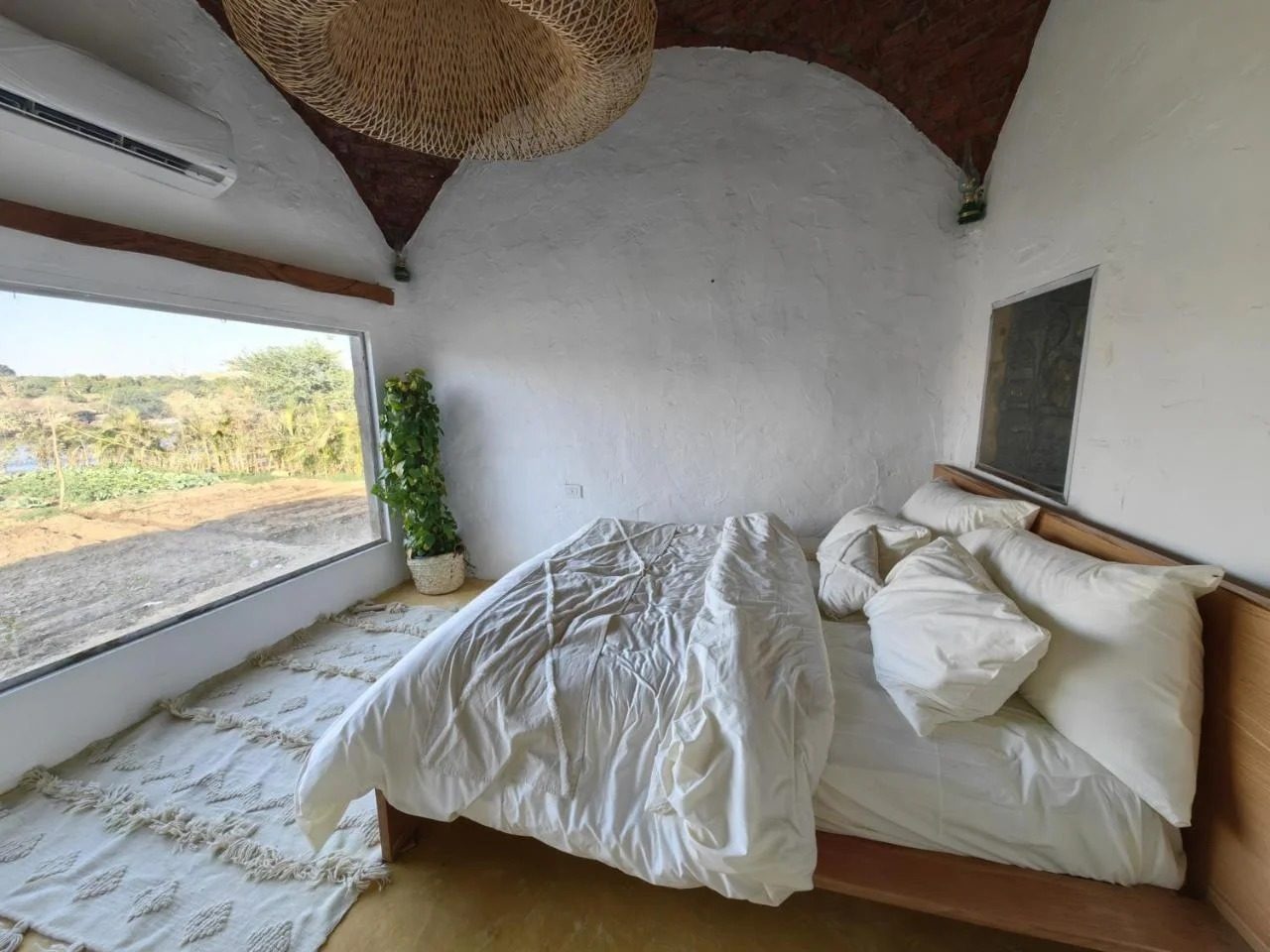 King Room – Nile View – Nubian Guesthouse, Aswan — Bedroom 1 in Nubian village on the West Bank of the Nile, Aswan, Egypt — photo 2