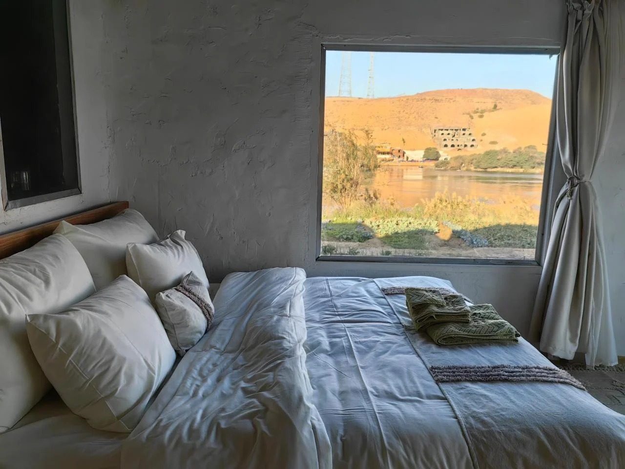 Junior Suite – Nile View – Nubian Guesthouse, Aswan — Bedroom 1 in Nubian village on the West Bank of the Nile, Aswan, Egypt — photo 3