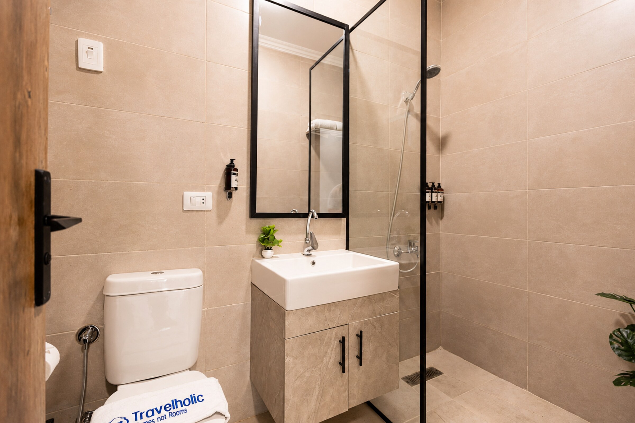 Travelholic Calm Corner 1BR with Balcony | Lotus 104 — Full bathroom 1 in Travelholic Residence near Mivida. Unit 104., Egypt — photo 2