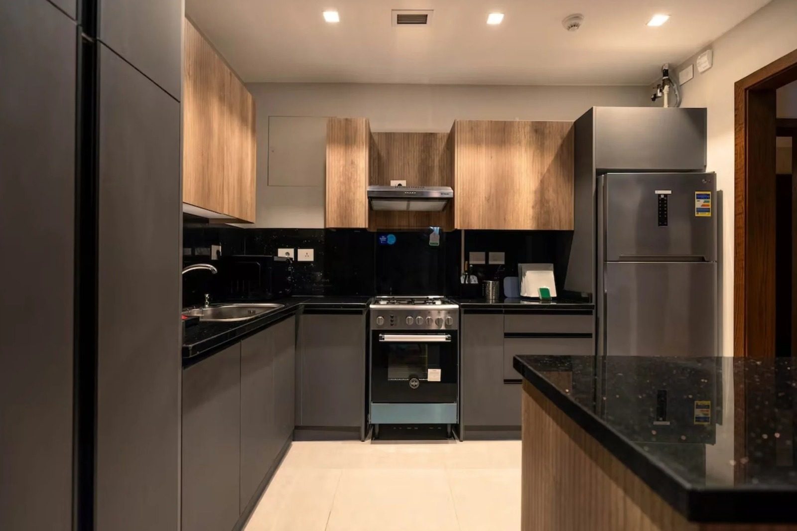 Bright 1BR Apartment with Balcony – Aeon Towers, Sheikh Zayed — Full Kitchen in Aeon Towers, Sheikh Zayed City, Egypt