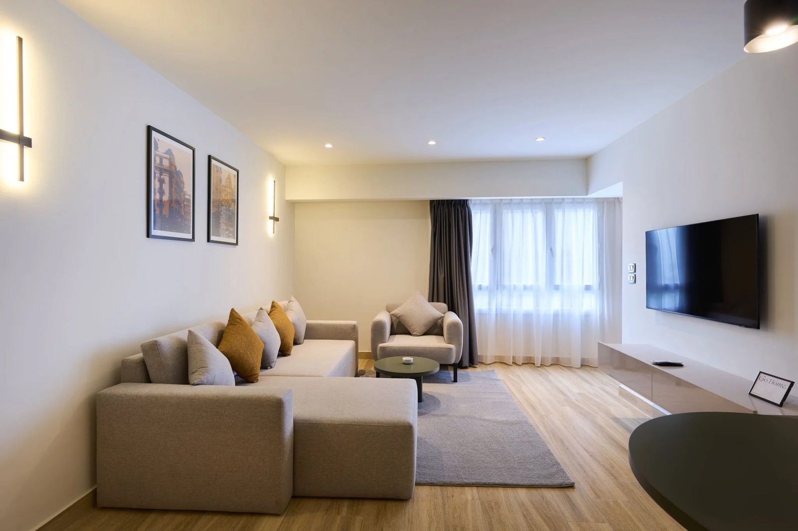 Warm High-Floor Studio – City View – Giza — Living Room in Giza Nile side, near Orman Botanical Garden & Cairo University, Egypt