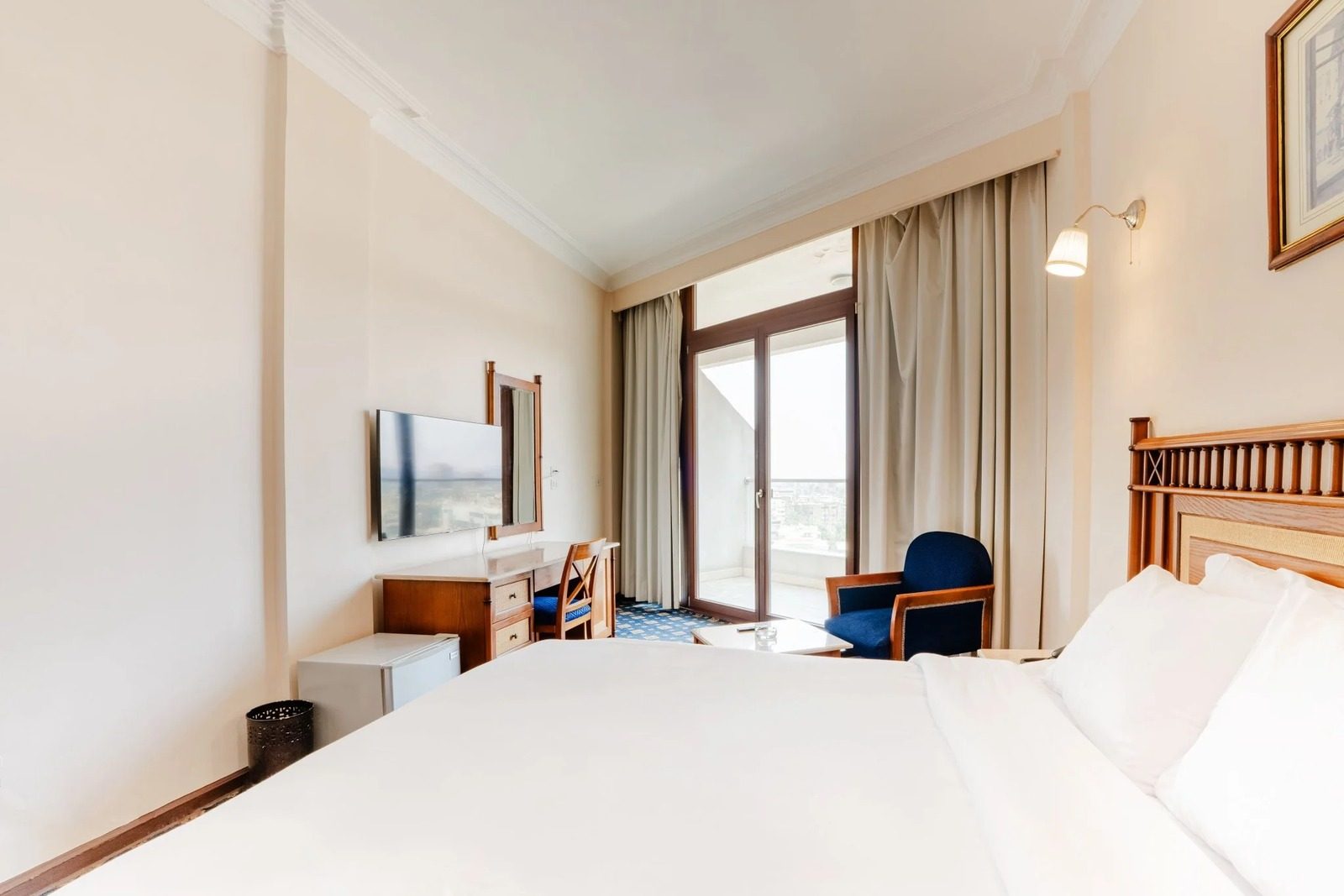Executive King Room with Balcony – City View – Nile-side Hotel, Zamalek — Bedroom 1 in Nile side of Zamalek, Cairo, Egypt — photo 2