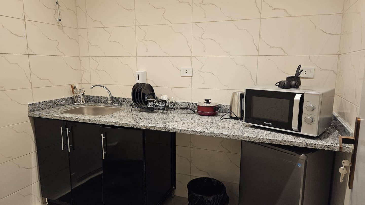 DHB STAYS | Luxury 1BR Tahrir Square | B-207 — Full Kitchen in Downtown Cairo (Marouf), Cairo Governorate, Egypt, Egypt — photo 2