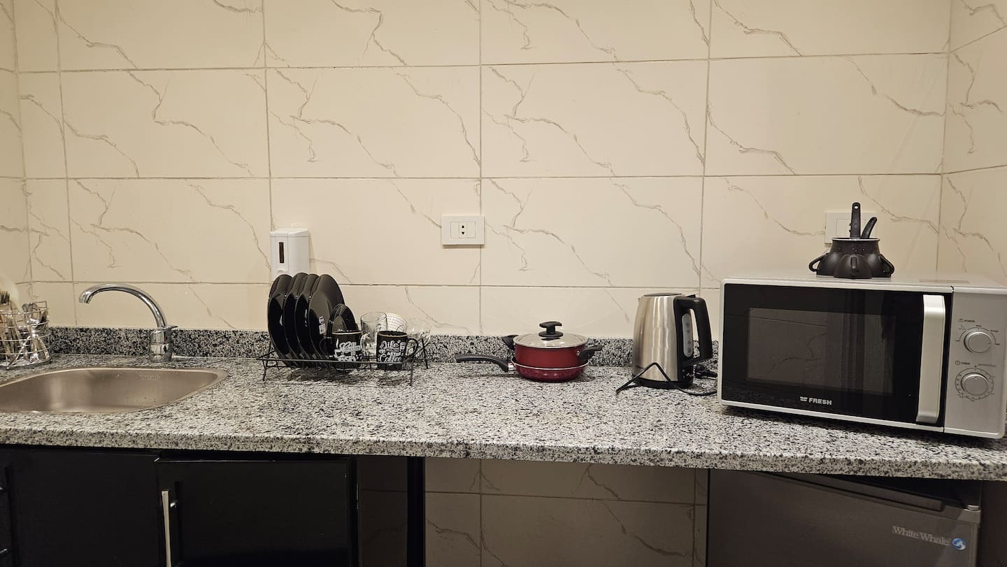 DHB STAYS | Luxury 1BR Tahrir Square | B-207 — Full Kitchen in Downtown Cairo (Marouf), Cairo Governorate, Egypt, Egypt — photo 3