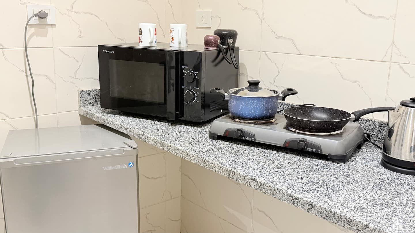 DHB STAYS | Central Cairo 1BR Suite | G-401 — Full Kitchen in Downtown Cairo (Marouf), Cairo Governorate, Egypt, Egypt — photo 2