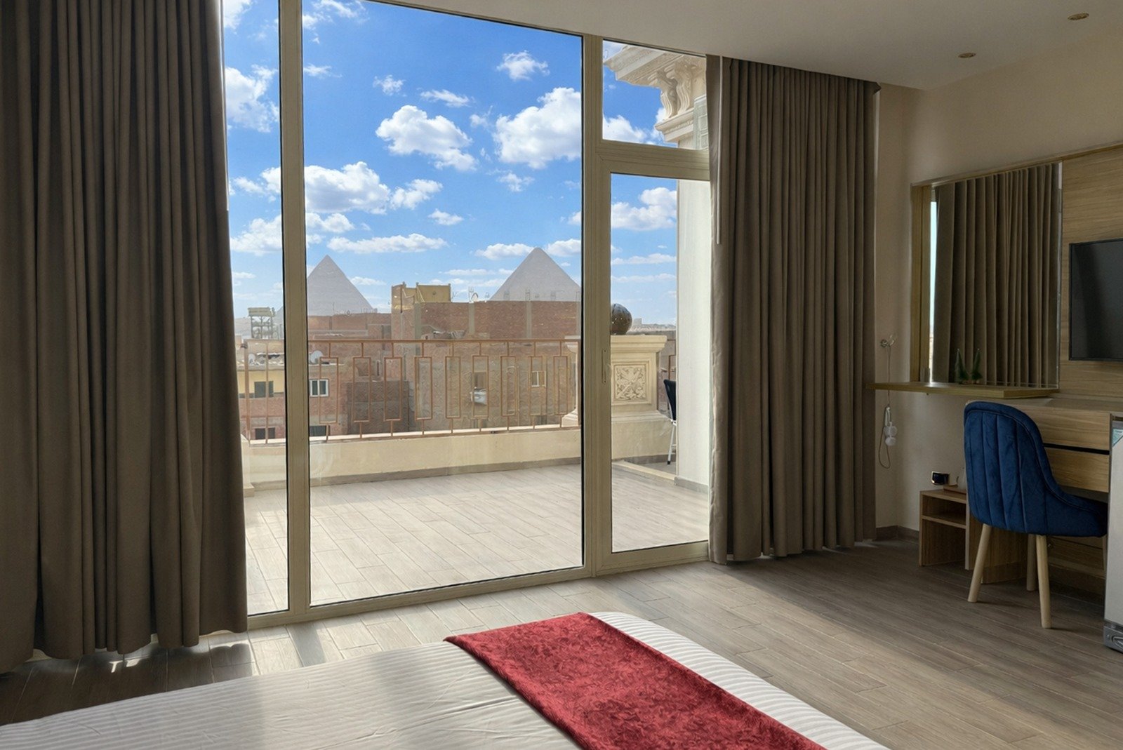 Deluxe Triple Room with Balcony – Pyramids Khan Hotel, Giza — Balcony in Pyramids Khan Hotel, Al Haram, Giza, Egypt