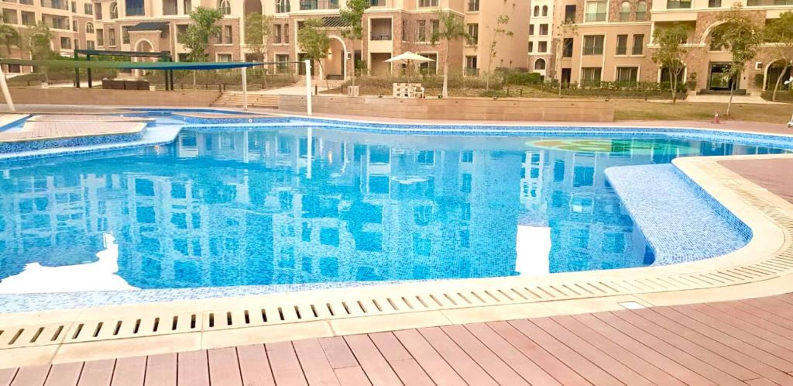 Pool Side New 2-bed Luxury Gated 90 Avenue TBK AUC — Apartment in First New Cairo, Egypt — photo 16