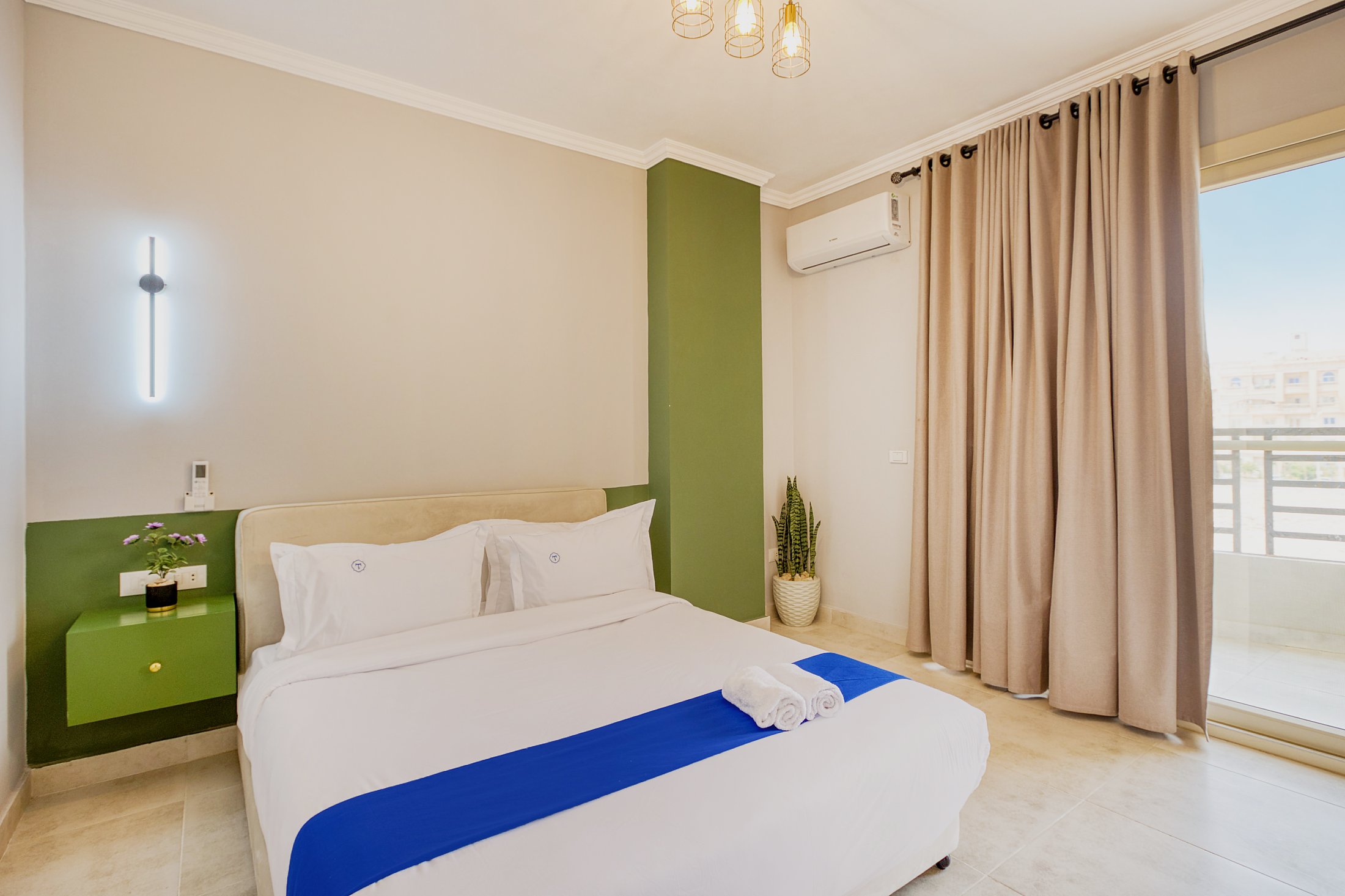Travelholic Green Light 2BR with Balcony | Lotus 303 — Apartment in Travelholic Residence near Mivida. Unit 303., Egypt — photo 2